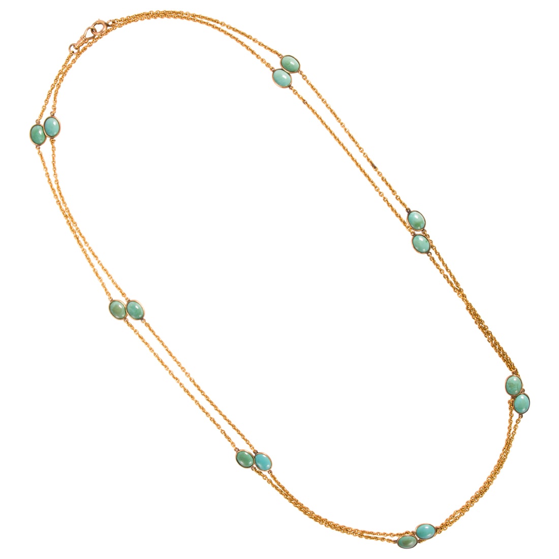 An antique turquoise and 14k gold longchain: An antique turquoise and 14k gold longchaindesigned with 14 oval-shaped double cabochon turquoise; length: 54 in; 30.35 grams
