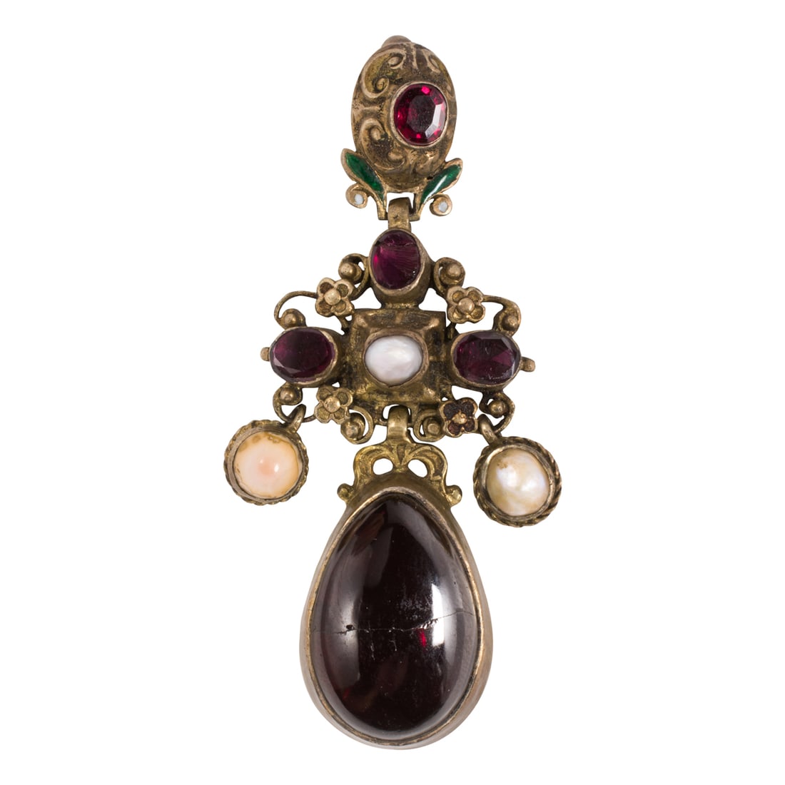 An antique Austro-Hungarian garnet and gilt silver pendant: An antique Austro-Hungarian garnet and gilt silver pendantOf open-form floral design, featuring a pear-shaped, foil-backed garnet cabochon measuring 19.47 x 13.96 mm, the verso inscribed with ornate