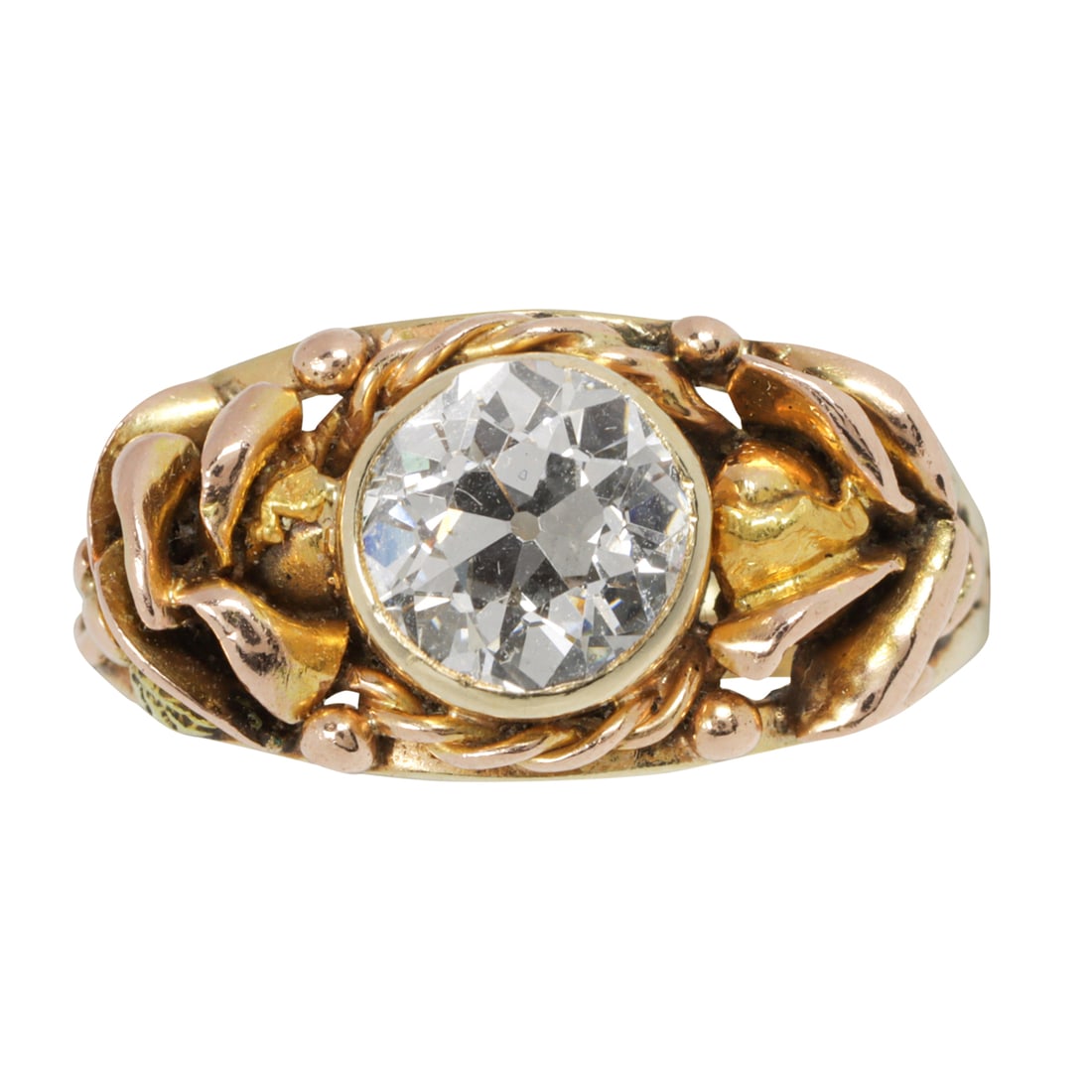 An antique diamond and 14k gold ring: An antique diamond and 14k gold ringcentering an European-cut diamond weighing an estimated 1.20 carats, bezel-set in a stylized floral mount; size: 5; 4.07 grams