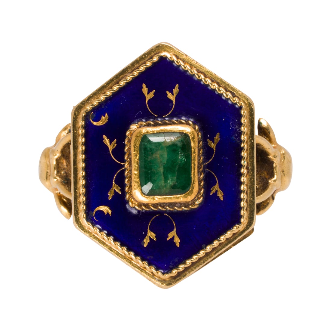 A Victorian emerald, enamel and 18k gold poison pill ring: A Victorian emerald, enamel and 18k gold poison ringof hexagonal design with blue and gold enamel decoration, the hinged top centering an emerald-cut emerald weighing approximately 0.75 carat, with