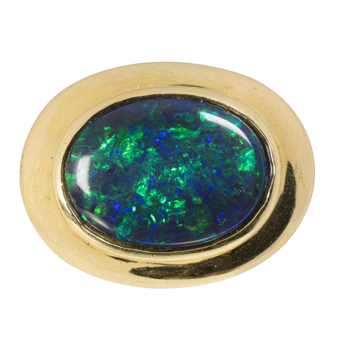 A black opal and 18k gold ring: A black opal and 18k gold ringcentering an oval-shaped opal doublet, set horizontally in a heavy gold mount; size: 7; 18.16 grams