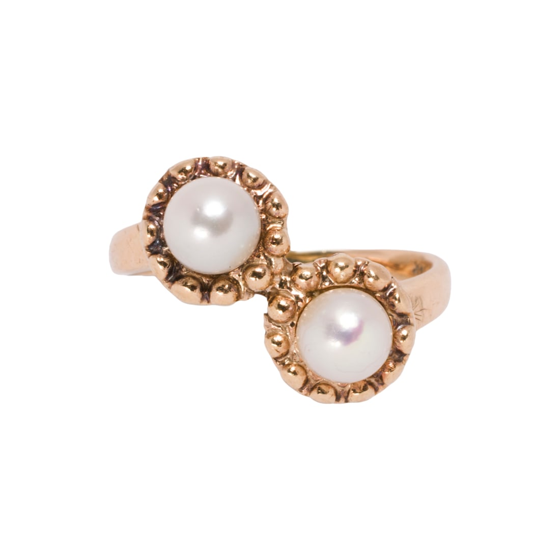 A cultured pearl and 14k gold ring: A cultured pearl and 14k gold ringOf bypass design, set with two cultured pearls measuring 5.51 mm; size 8 1/2; 4.70 grams