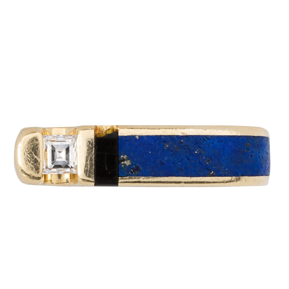 A lapis lazuli, diamond, onyx and 14k gold ring: A lapis lazuli, diamond, onyx and 14k gold ringdesigned with inlaid lapis and onyx plaques, highlighted with a princess-cut diamonds; size 8; 7.84 grams