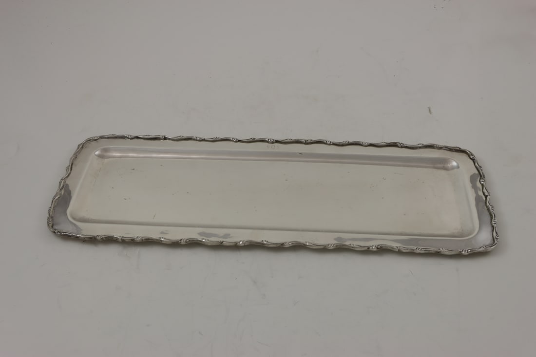 A Mexican Sterling Rectangular Tray: A Mexican sterling rectangular tray, monogrammed 'SOS', 19.75"l x 7.25"d, 23.56 troy oz