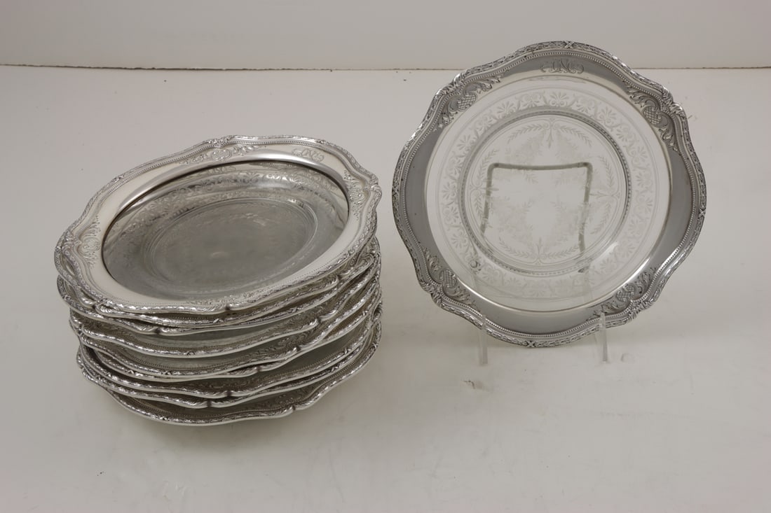 A Service of American Dominick and Haff Sterling Mounted Etched Glass Plates: A service of American Dominick and Haff sterling mounted etched glass plates each monogrammed. 9.5"dia [10 total]