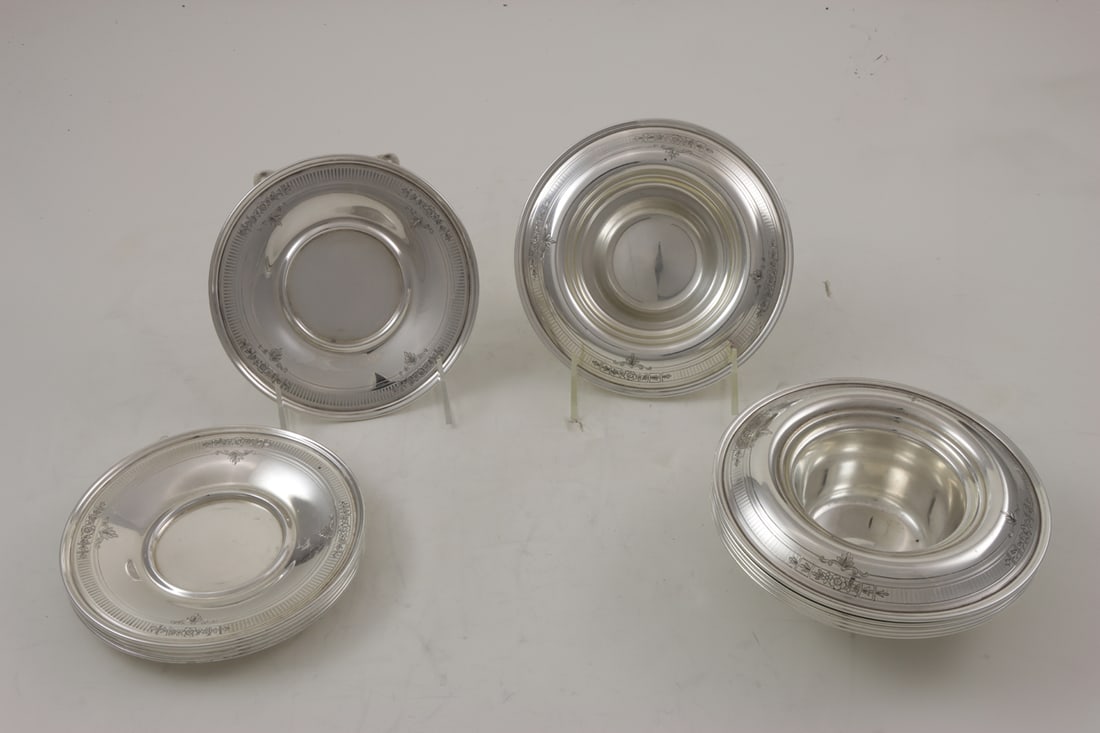 A Service of American Shreve and Co San Francisco Sterling Bowls and Undertrays: A service of American Shreve and Co San Francisco sterling bowls and undertrays comprising (6) bowls monogrammed 'ANA', 2"h x 6.5"dia; (6) matching undertrays, unmonogrammed, 6"dia. 49.95 troy oz [12