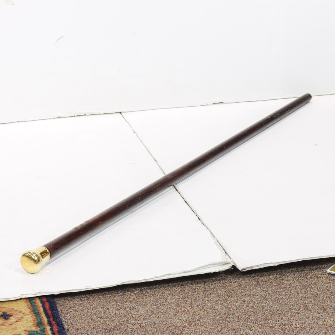 An American presentation walking cane: An American presentation walking cane, late 19th century, the likely vermeil (gold-washed silver) knob handle engraved 'T. Hedges, No. 19 West 20 st', unmarked, handle 1.5"h; overall 36.5"h. Note: In