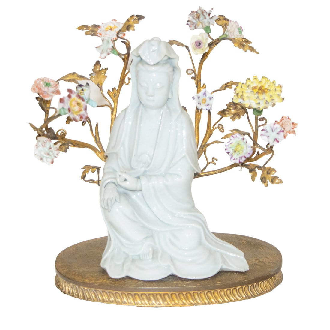 A French gilt metal and porcelain mounted Chinese blanc de Chine porcelain figure of Guan Yin: A French gilt metal and porcelain mounted Chinese blanc de Chine porcelain figure of Guan Yin, overall 10.5"h x 10.5"w x 5.75"d