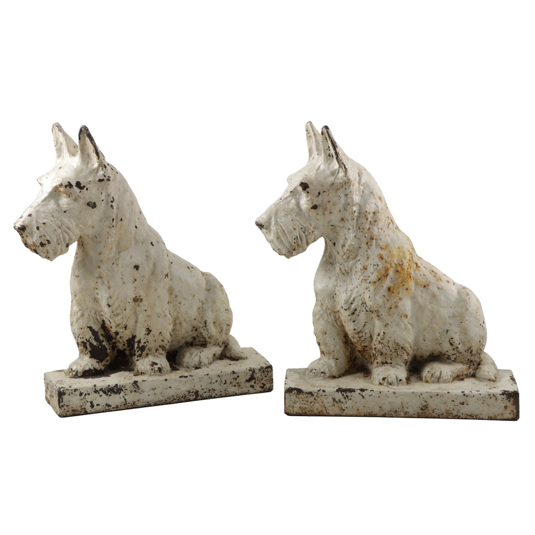 A large pair of American painted cast iron Scottish Terrier dogs: A large pair of American painted cast iron Scottish Terrier dogs, circa 1930s, likely originally andiron fronts, unmarked, 14"h x 11"w x 3.25"d. Note: The Scottish Terrier was a major design icon of