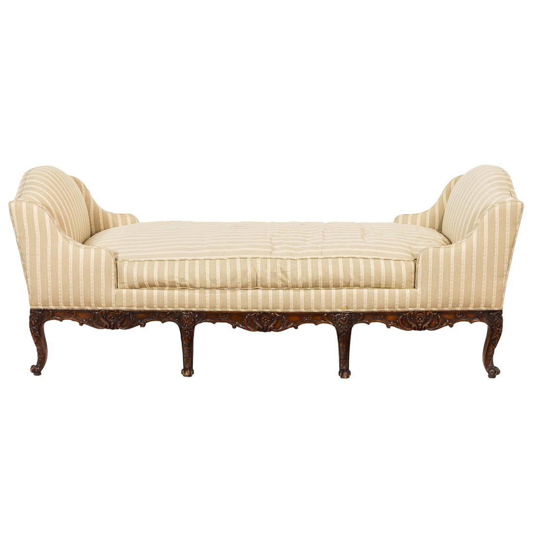 A French carved chaise circa 1900: A French carved chaise circa 1900, each side with camel back, with loose down cushion and rising on eight heavily carved cabriole legs, 33.5"h x 84.5"w x 31.5"d