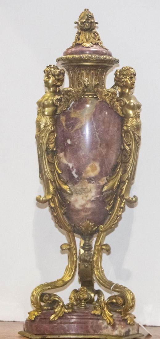 A Louis XV style gilt bronze mounted variegated marble urn: A Louis XV style gilt bronze mounted variegated marble urn, second half 19th century, of ovoid form raised on three maiden headed scrolled supports on conforming inswept base, unmarked, 21.5"h x 6"w