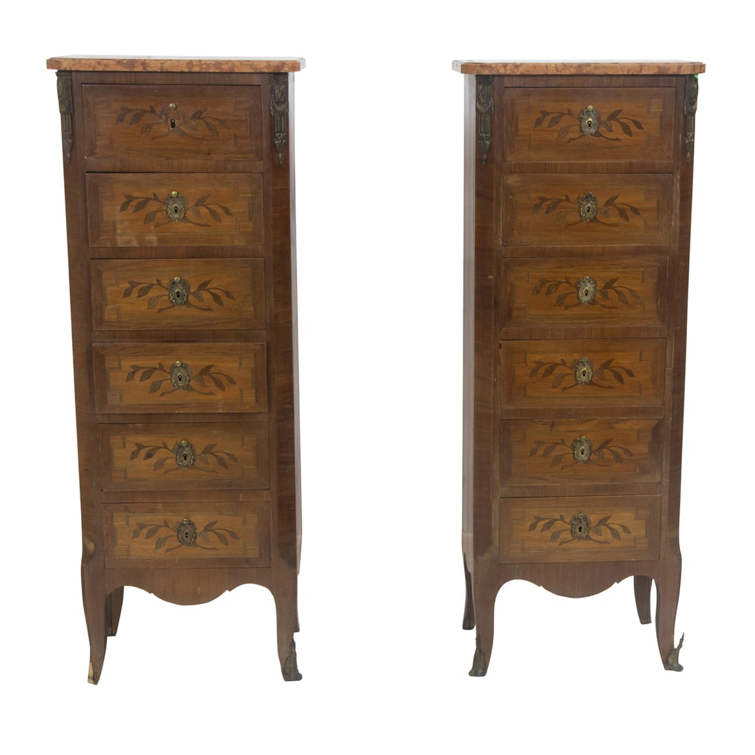 A pair of French marquetry decorated lingerie chests: A pair of French marquetry decorated lingerie chests, each with a marble top above the six drawers, each with floral marquetry, and rising on outswept legs, 45.5"h x 17"w x 11"d