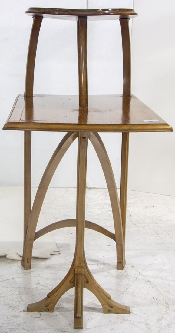 An Art Nouveau Pierre Selmersheim mahogany two tier table: An Art Nouveau Pierre Selmersheim mahogany two tier table, circa 1900, 43"h x 29.5"w x 19.5"d. Provenance: Bonhams New York sale 16090 20th century Furniture June 4, 2008