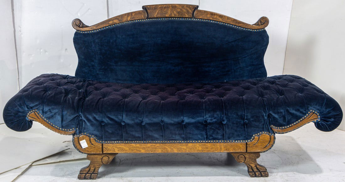 A late Victorian oak settee - 4