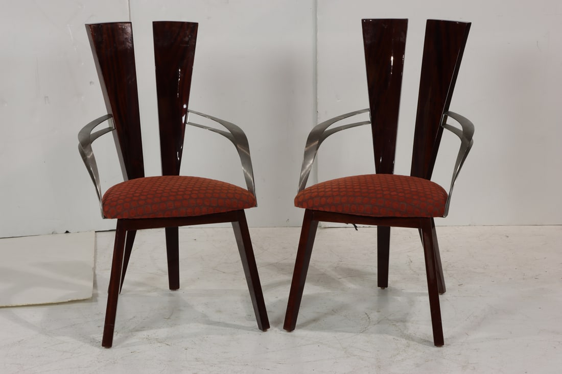 A pair of Art Deco style dining chairs: A pair of Art Deco style dining chairs, attributed to Mirak Furniture after a design by A. Soudavar, each with curved brushed metal arms, 37.5"h x 21.5"w x 18.5"d (seat)