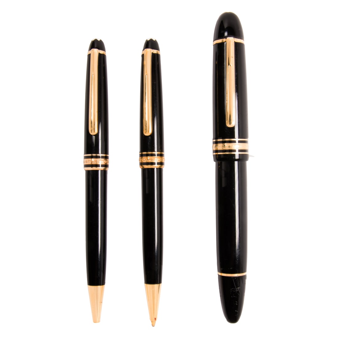 Three Montblanc Meisterstuck writing instruments: Three Montblanc Meisterstuck writing instruments, comprising a No.149 fountain pen with 14k gold nib marked '4810, 14K, Montblanc, 585' and a pen and pencil set, the rollerball marked '130340