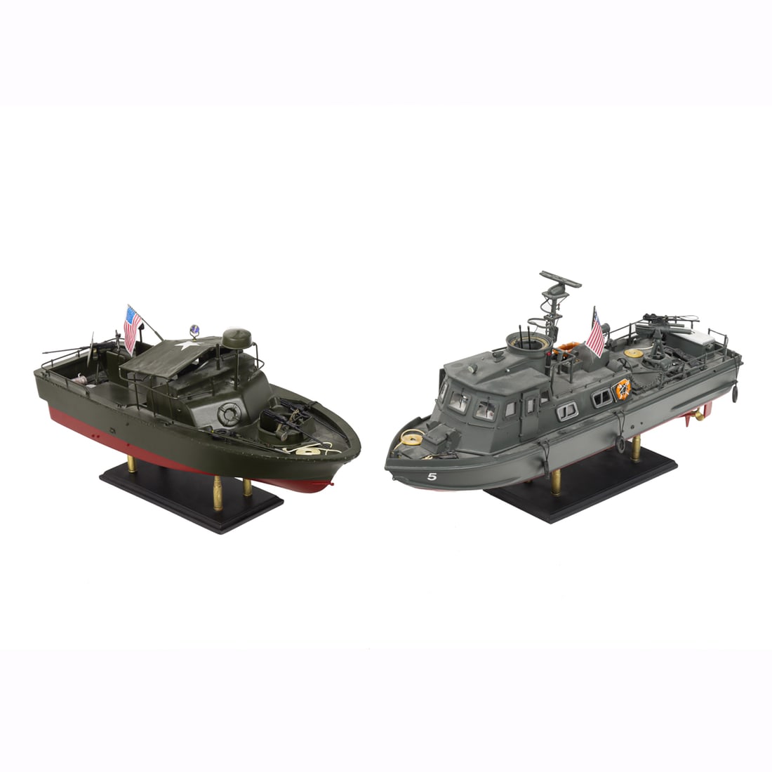 Two US swift boat models: Two US swift boat models, the first example marked 'PCF-5', overall PCF-5 11.5"h x 21.5"w 5"d; the second example in army green and burgundy, 10"h x 19"w x 6"d