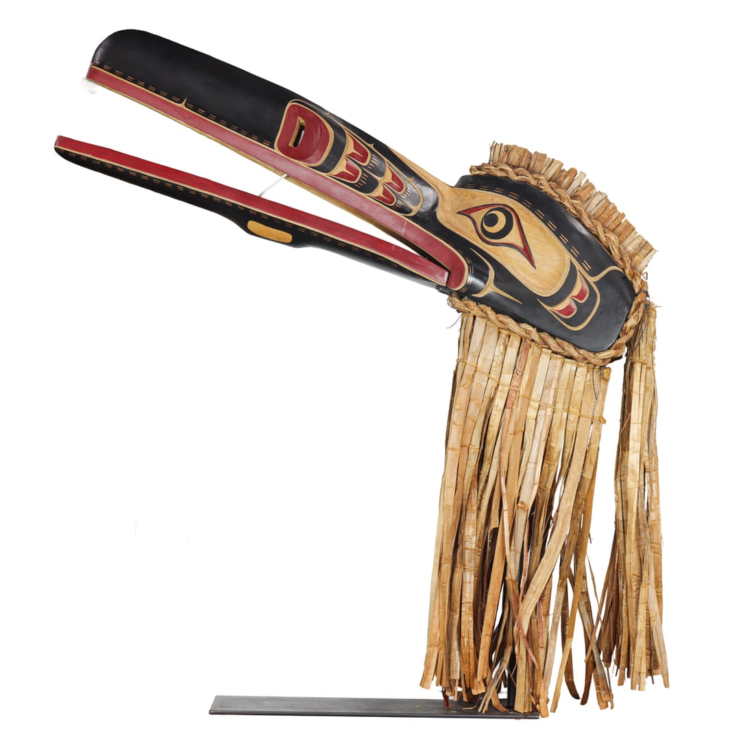 A large scale Pacific Northwest Coast carved cedar articulated Raven mask: A large scale Pacific Northwest Coast carved cedar articulated Raven mask, Bill Henderson (Kwakwaka?wakw, b. 1950), 2003, signed, titled and dated 'Bill Henderson, Raven, 2003', raised on stand,