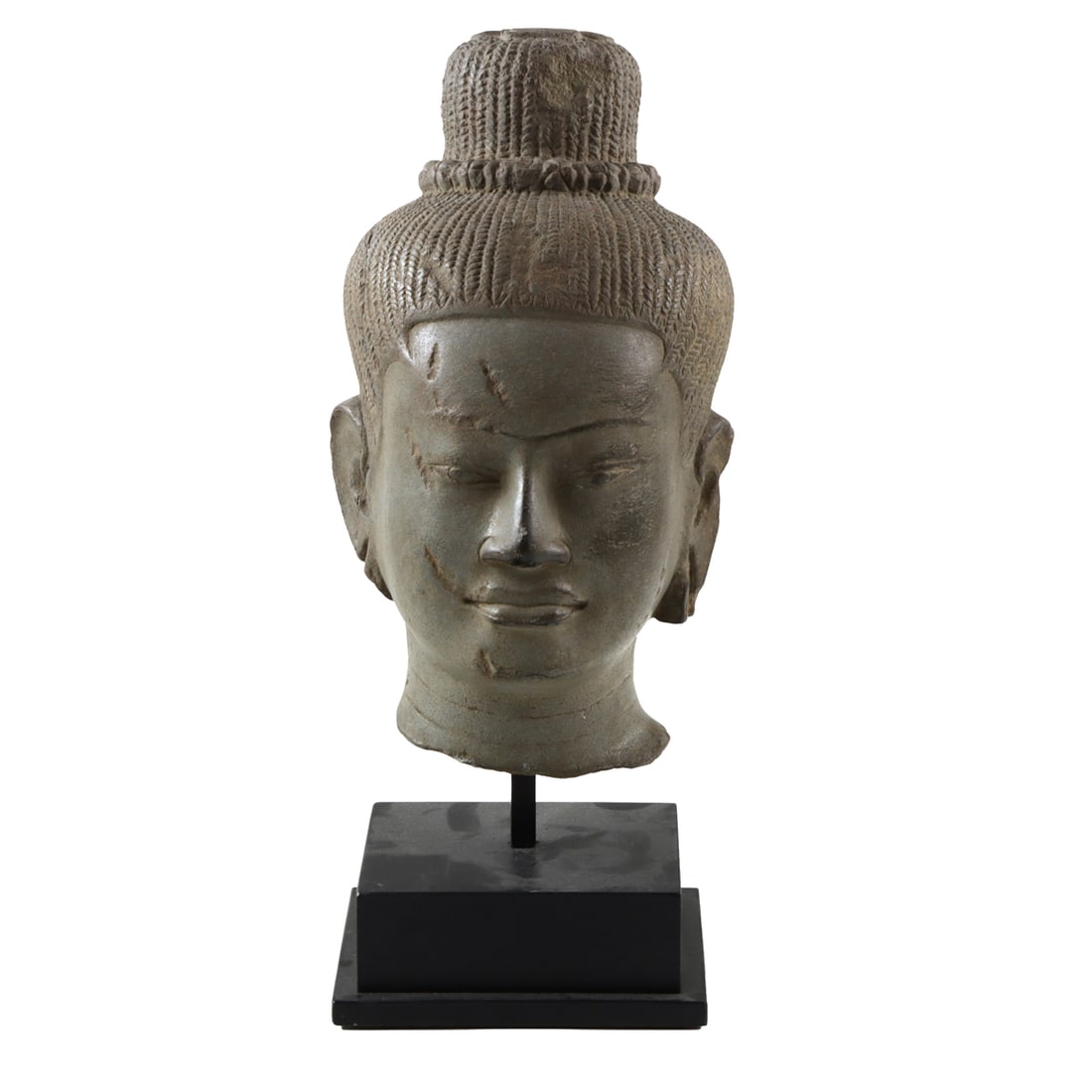 A Khmer stone head of Buddha (1 of 3)