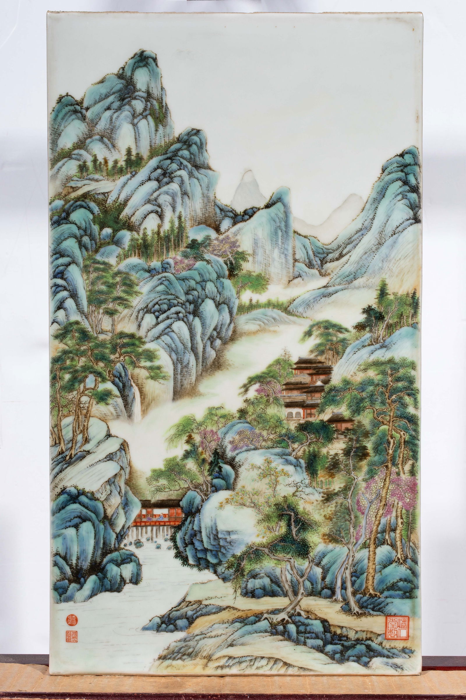 A Chinese famille rose 'landscape' porcelain plaque by Zhang Zhitang: A Chinese famille rose 'landscape' porcelain plaque by Zhang Zhitang. Depicting continuous mountainous river landscape, showing the Huairen tang seal along with two of the artists' seals, Republic per