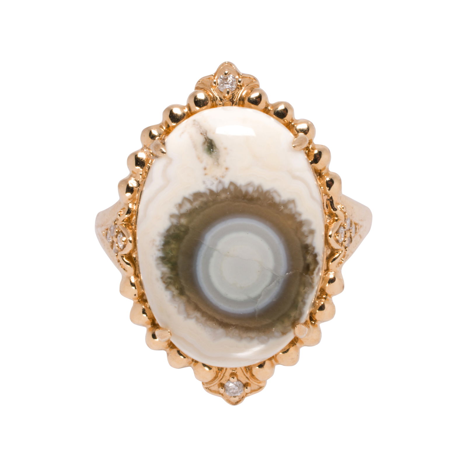 An agate, diamond, and 14k gold ring: An agate, diamond, and 14k gold ringDesigned with an oval-cut agate cabochon measuring 17.70 mm long, accented by 10 round-cut diamonds; size 7 1/4; 5.50 grams