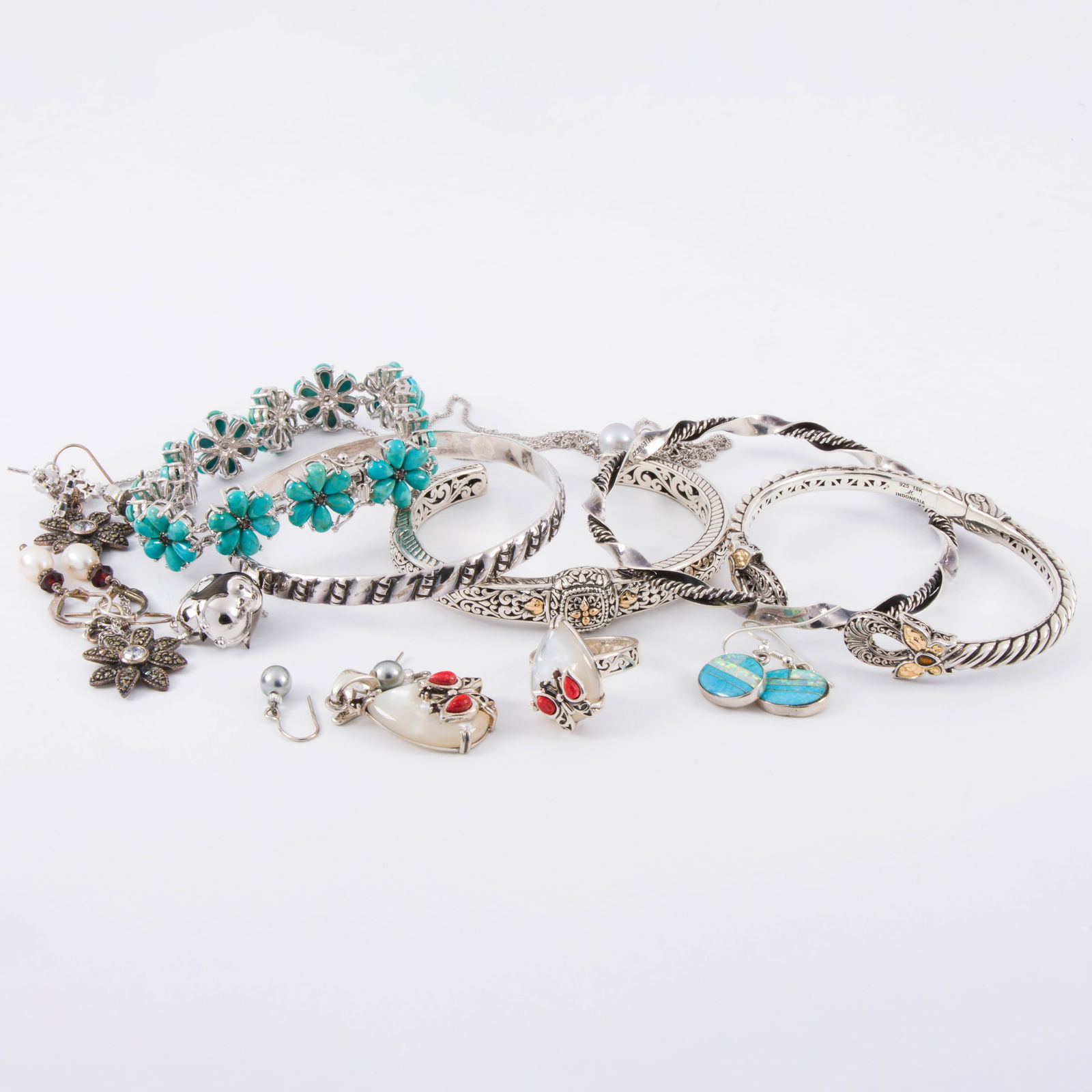 A group of silver jewelry (1 of 1)