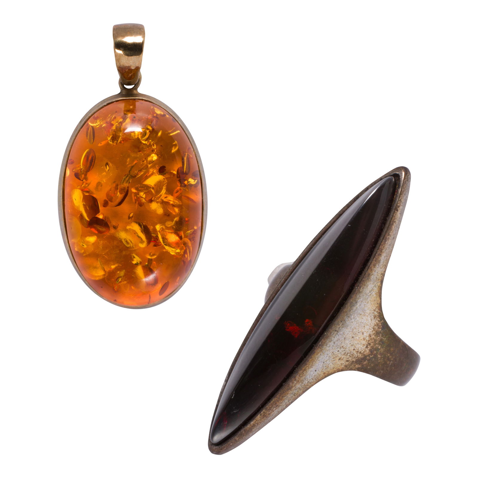 A Valero garnet and silver ring: A Valero garnet and silver ringSet with a marquise-shaped garnet cabochon measuring 40.00 x 7.42 mm; size 9; 8.50 grams