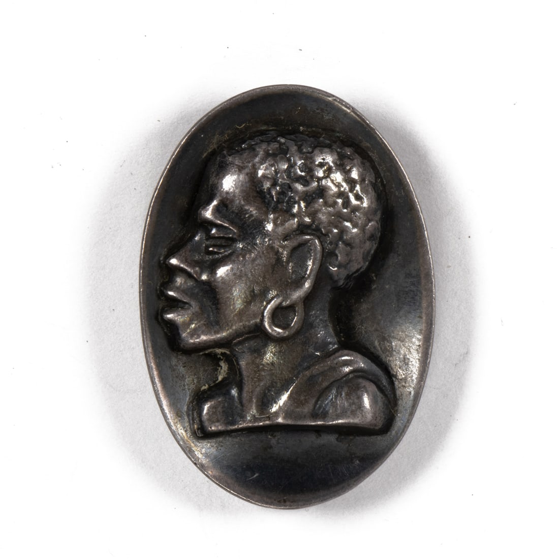 A Birger Haglund sterling silver pin: A Birger Haglund sterling silver pinFeaturing the side profile of a woman; length: 1 3/8 in; 10.35 grams