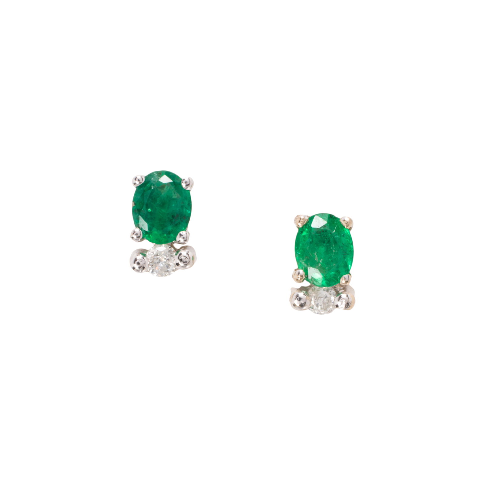 A pair of emerald, diamond and 14k gold stud earrings: A pair of emerald, diamond and 14k gold stud earringseach centering a oval-cut emerald each weighing approximately 0.20 carats, accented by single-cut diamonds; length: 1 1/4 in; 2.00 grams