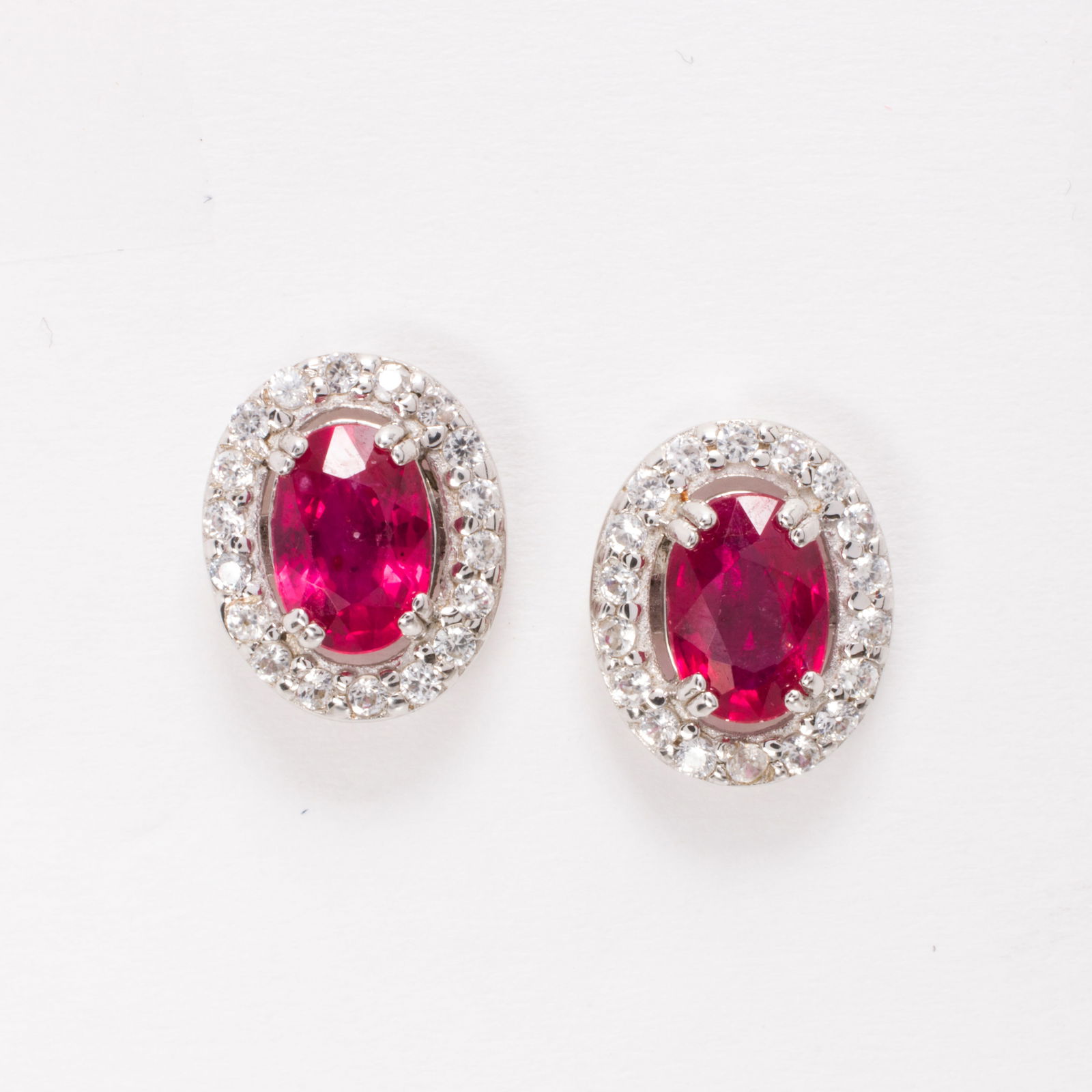 A pair of synthetic ruby, zircon, and sterling silver earrings (1 of 1)