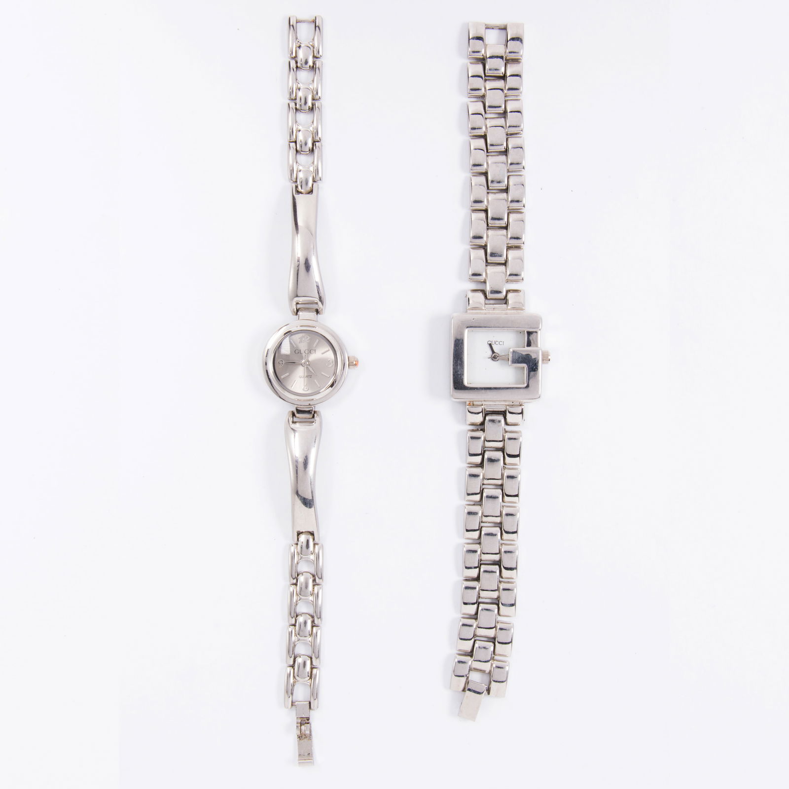 Two stainless steel Gucci watches: Two stainless steel Gucci watchesComprising two stainless steel Gucci watches of varying styles; gross weight: 78.70 grams