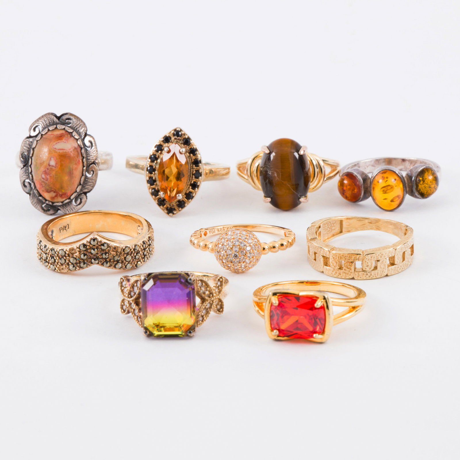 A group of silver and gold-tone hardstone rings (1 of 1)