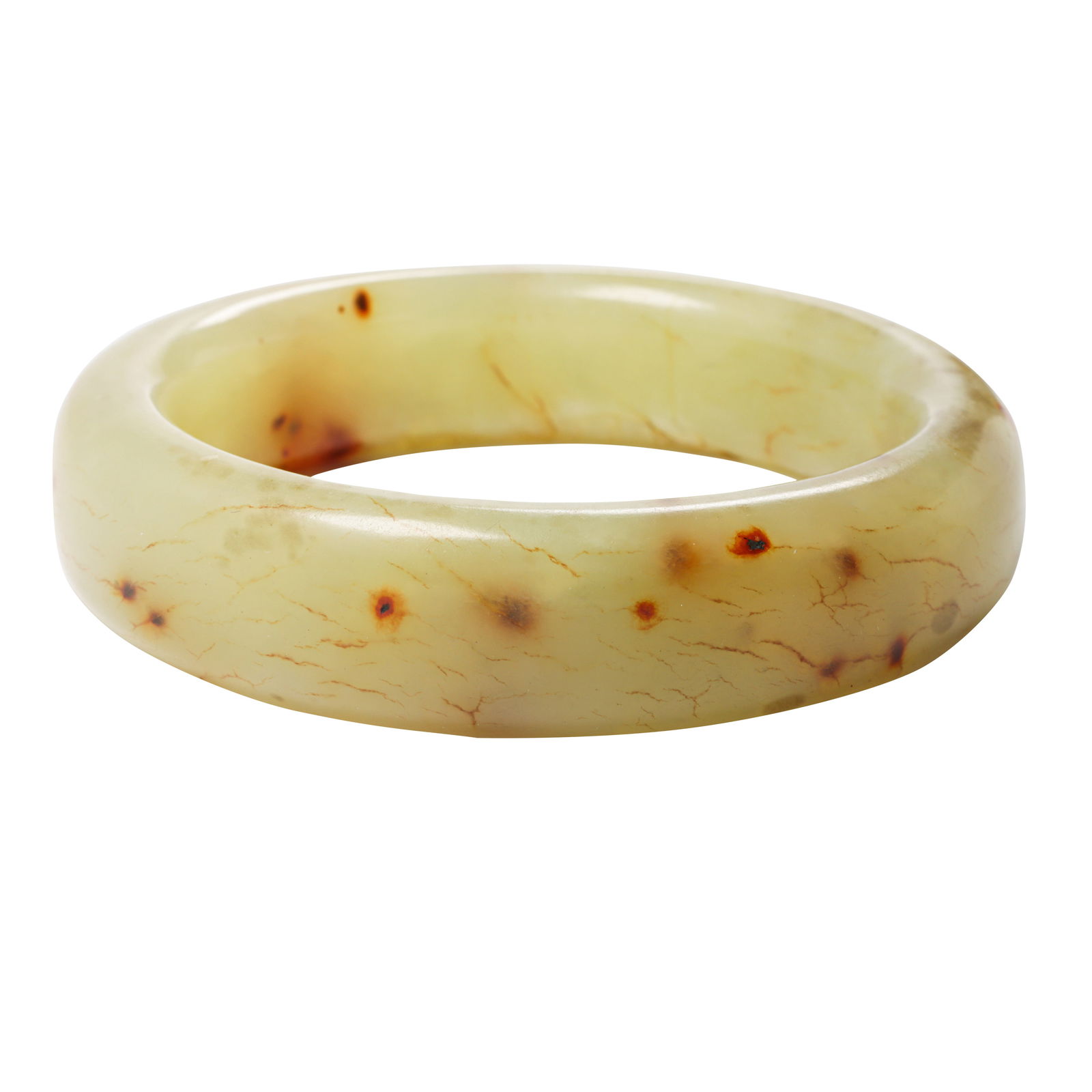 A hardstone bangle bracelet: A hardstone bangle braceletdesigned as a closed bangle; interior circumference: 7 3/4 in; 118.40 grams