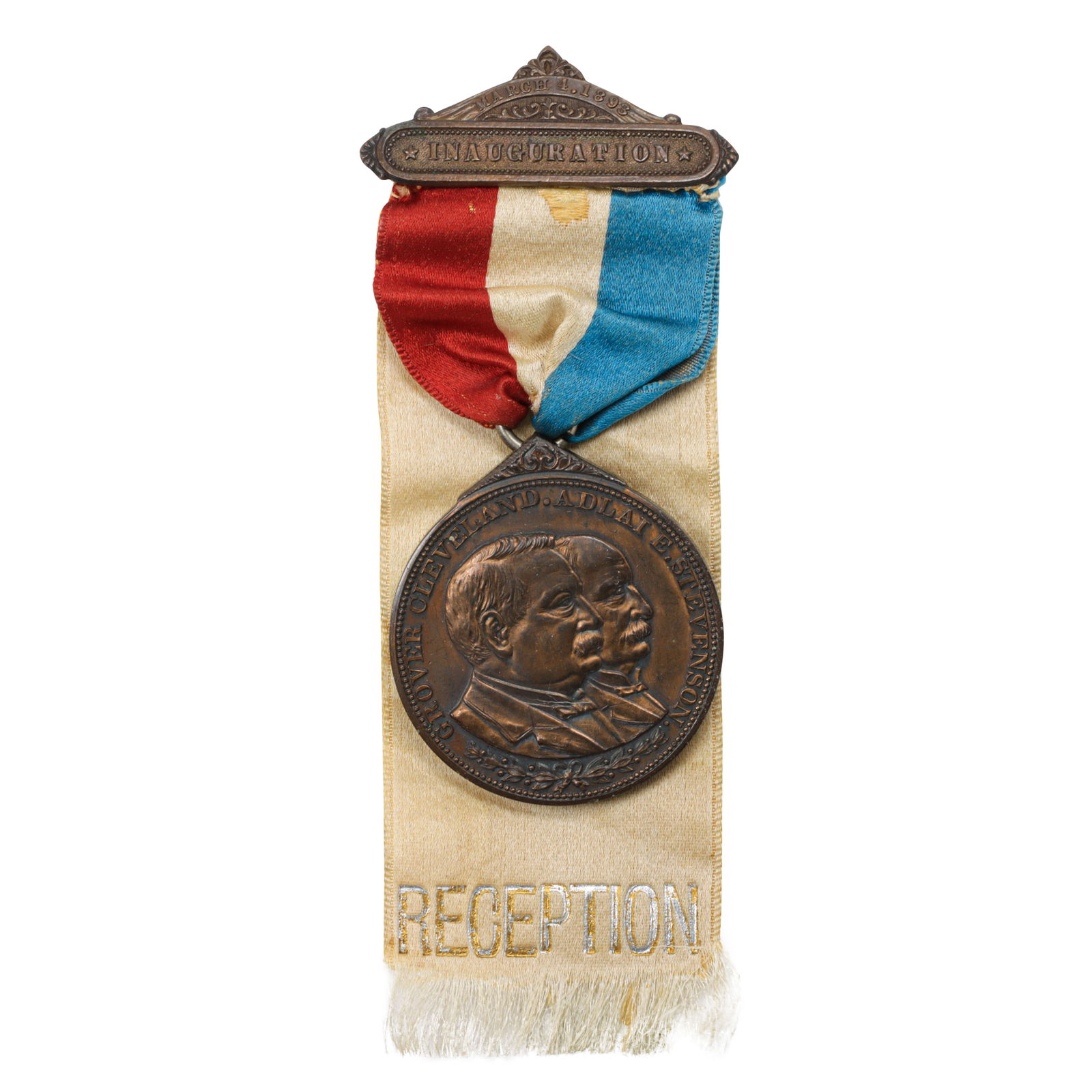 Grover Cleveland inauguration reception medallion pin, 1893: Grover Cleveland inauguration reception medallion pin, 1893Depicting Grover Cleveland and Adlai E. Stevenson, on red white and blue ribbon; length: 5 in; 39.50 grams