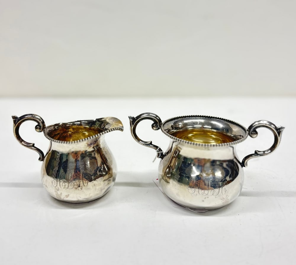 An American Sterling Sugar and Creamer: An American sterling sugar and creamer monogrammed 'HLH', greatest 3"h, 4.72 troy oz [2 total]