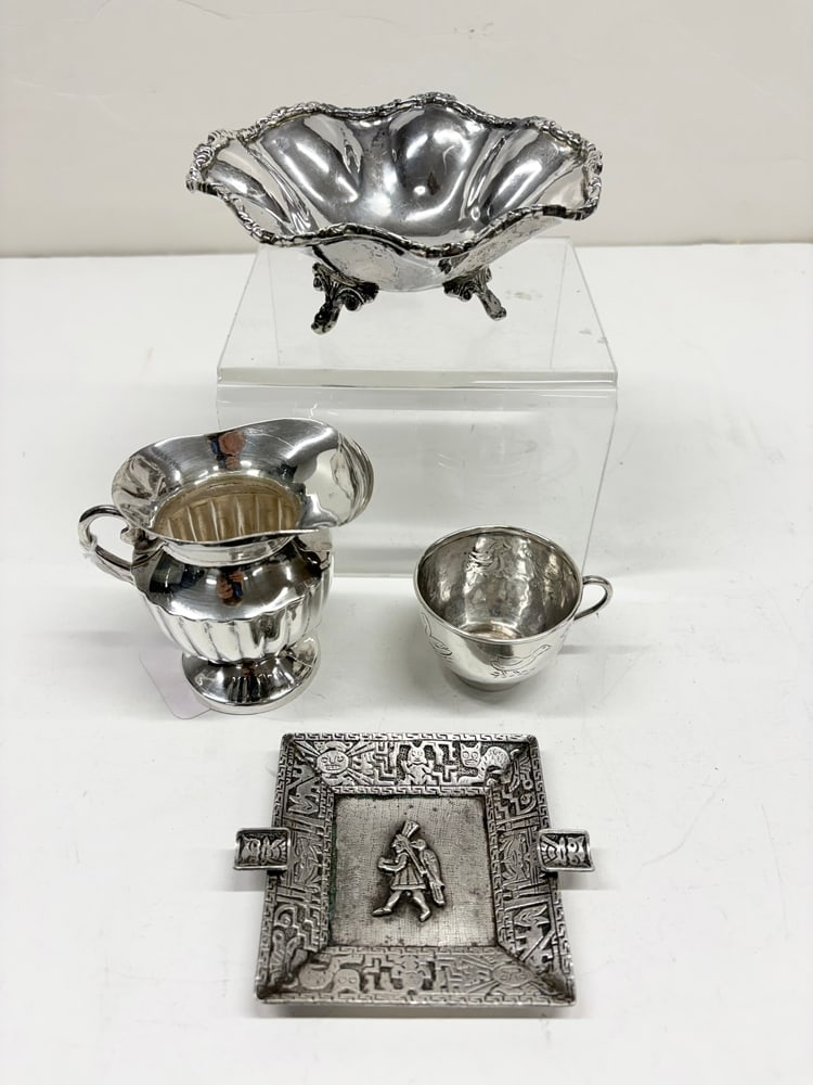 A Juventino Lopez Reyes Mexican Sterling Creamer with Others: A Juventino Lopez Reyes Mexican sterling creamer with others, comprising (1) Reyes sterling creamer, 3.75"h; (1) Mexican sterling footed bowl, 2.25"h; (1) child's cup, 1.75"h; (1) Peruvian sterling