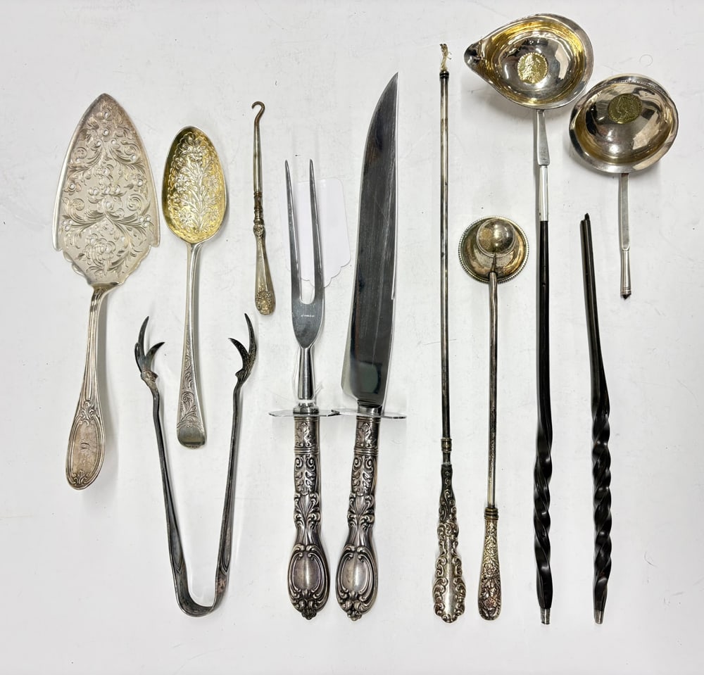 A Collection of English and American Silver and Silverplate Table Articles: A collection of English and American silver and silverplate table articles, comprising (2) English ladles with spiral wooden handles, 4.75"; (1) two-piece sterling handled carving set, greatest 14"l;