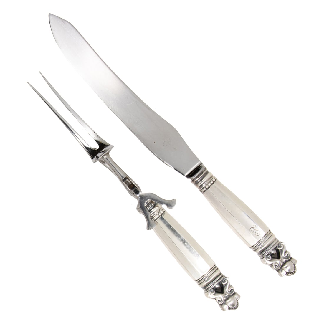 A George Jensen Acorn pattern sterling carving set: A George Jensen Acorn pattern sterling carving set. Both pieces monogrammed with an 'L' in script, the greatest 12.5 "l [2 total]