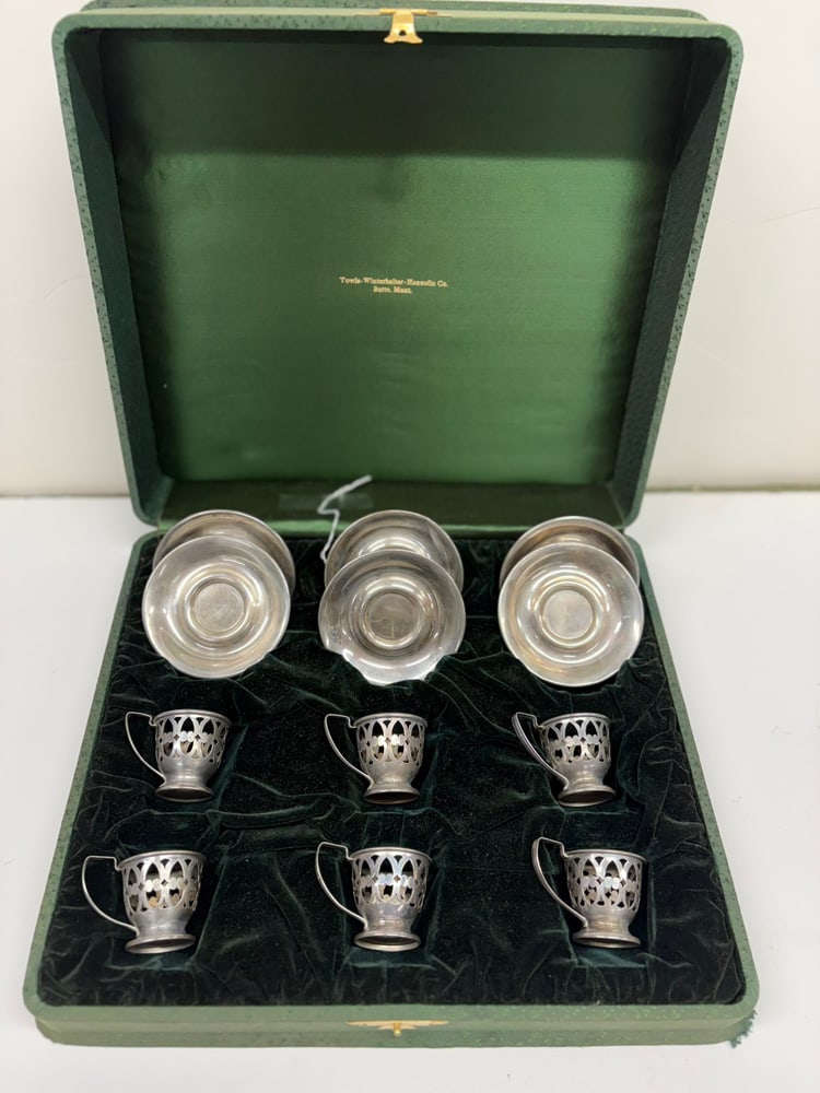 An Alvin Sterling Demitasse Cup Service with Saucers: An Alvin Sterling demitasse cup service with saucers, comprising (6) reticulated holders, 1.75"h and (6) saucers, 3.625"dia, porcelain liners are not present. 7.25 troy oz [12 total]