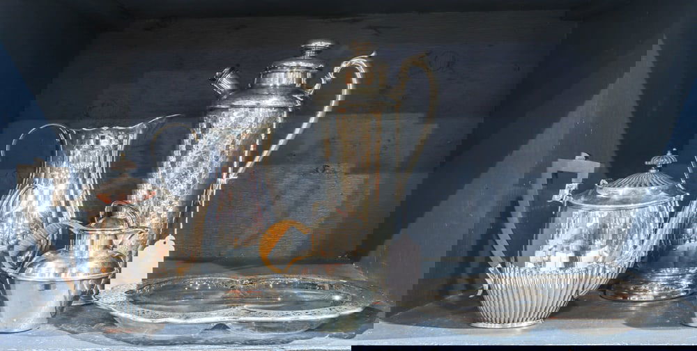 A Sterling and Silverplate Bar Grouping: A sterling and silverplate bar grouping, comprising in silverplate (1) International Silver cocktail shaker, 13"h; (1) Sheffield Silver Co. pitcher, 9.25"h; (1) coffee pot, 7.5"; (1) pitcher 5.5"h;