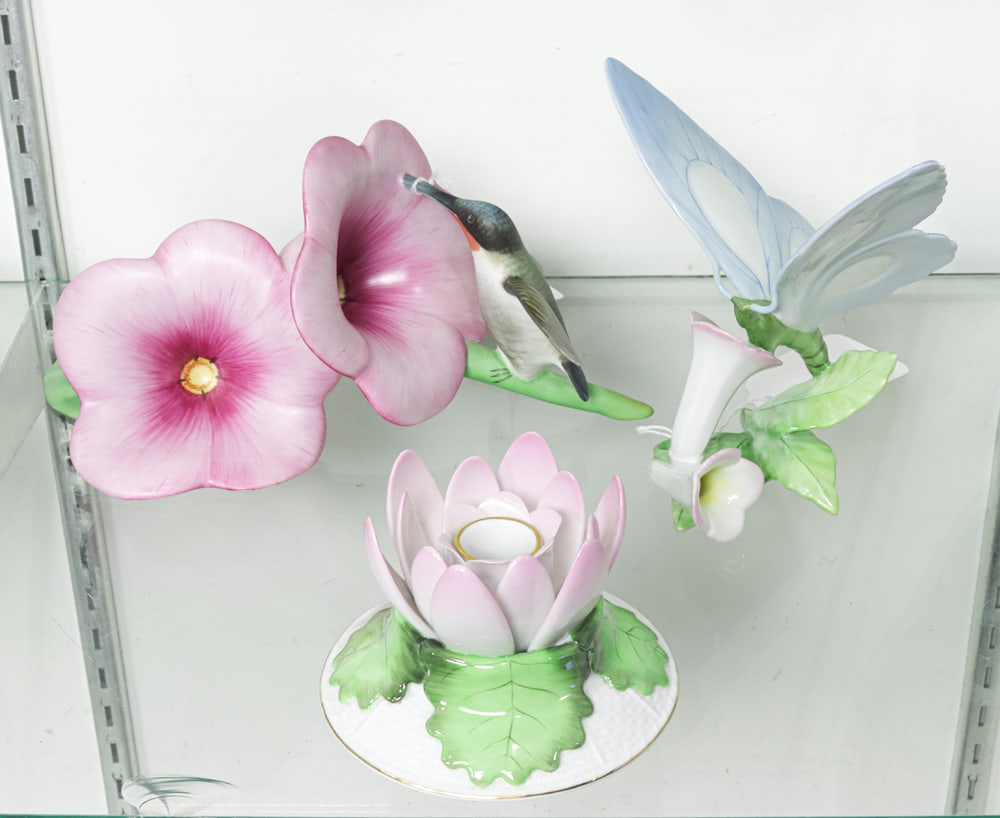 Three Herend Flora and Fauna Porcelain Figures: Three Herend porcelain flower, insect and bird figures, comprising (1) humming bird, 15882-0-00/MCD, limted edition No. 217/225, 4.5"h x 10"l; (1) butterfly, 9305-0-00/C, 5.75"h; (1) candlestick,