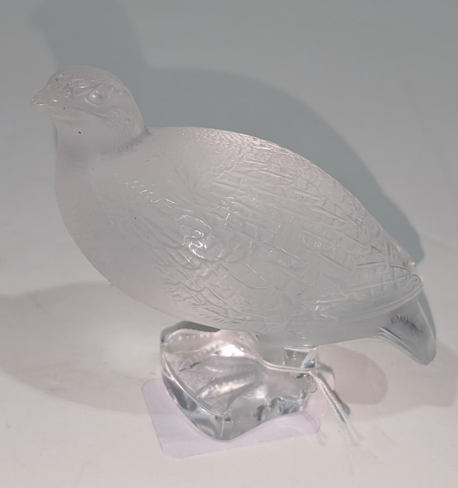 A Lalique Quail Figure: A Lalique glass quail figure, signed Lalique France in script to base, 5.25"h