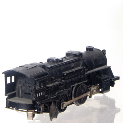A Lionel Train Engine: A Lionel train engine, #1110, mid-20th century, factory label to underside, 9"l
