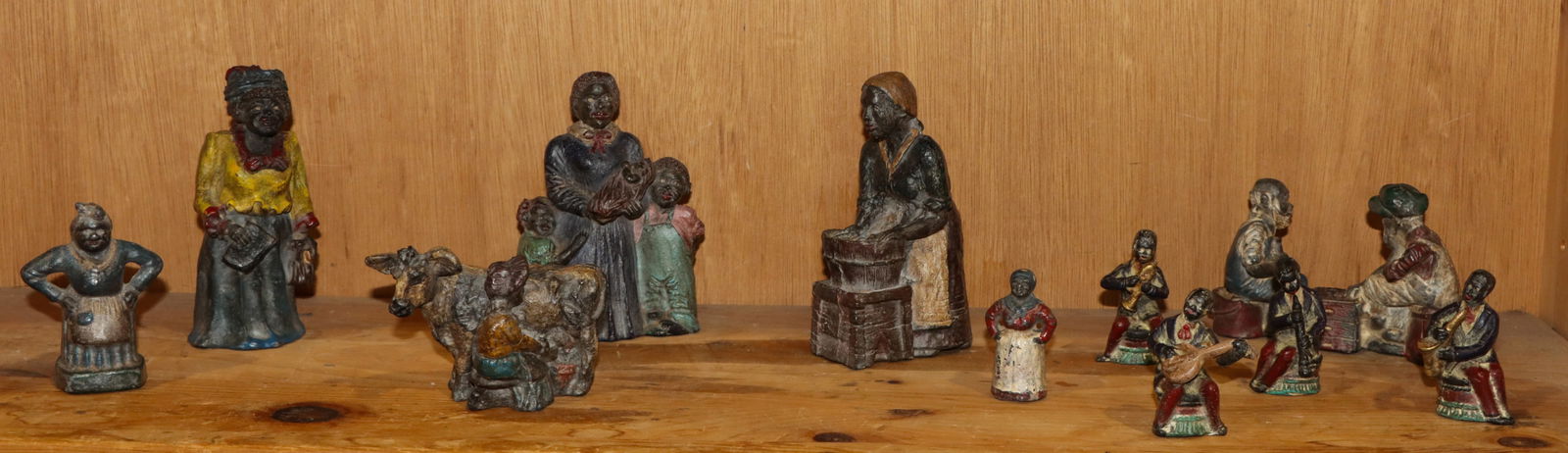 A group of eleven Black Americana painted lead figures: A group of eleven Black Americana painted lead figures, 2.5"h to 5.50"