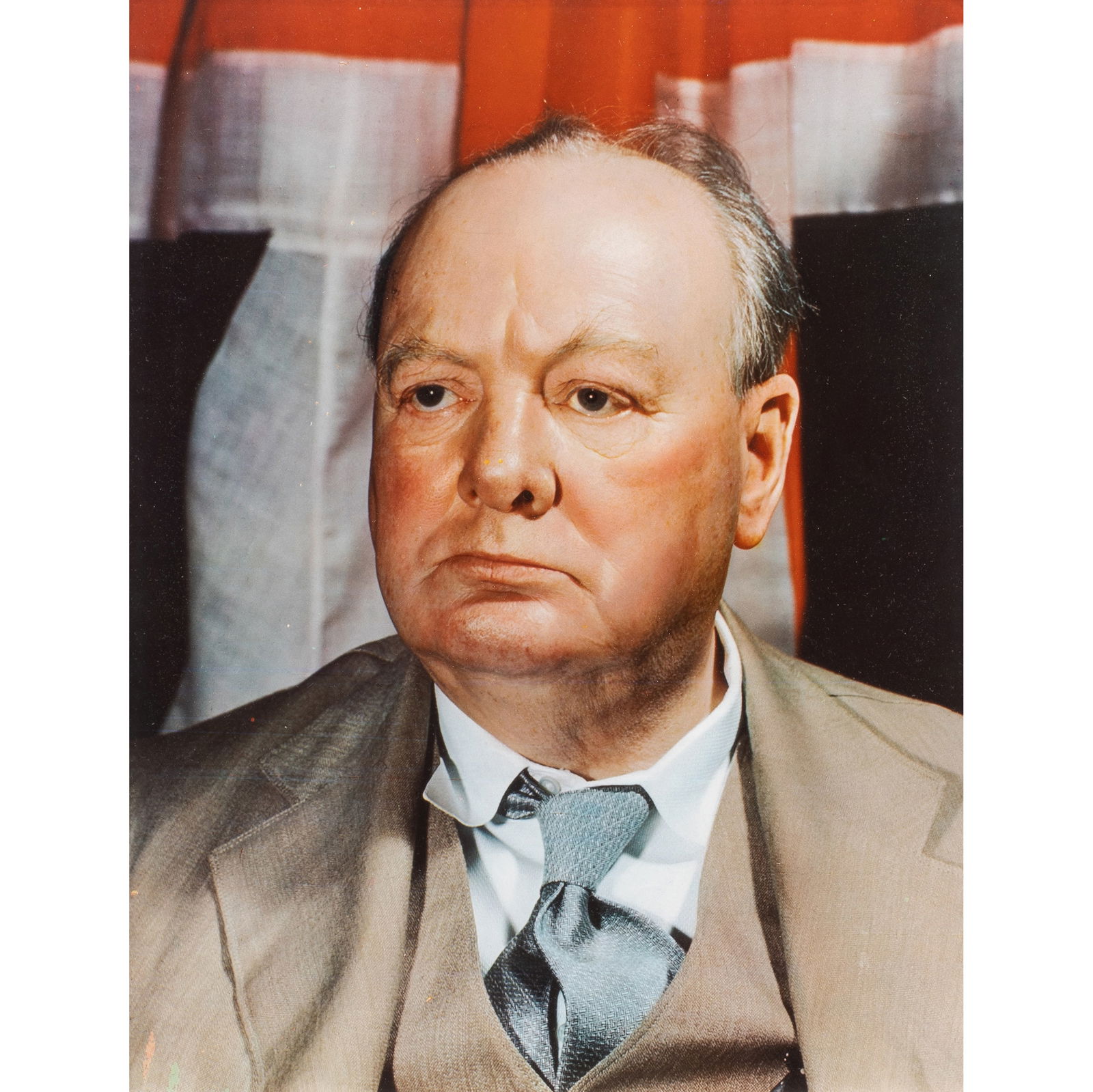 A framed color photograph of Winston Churchill with signature on paper: A framed color photograph of Winston Churchill with signature on paper mounted to mat, a brass plaque mounted to the glass inscribed, 'This autographed picture of Winston Churchill, photographed at