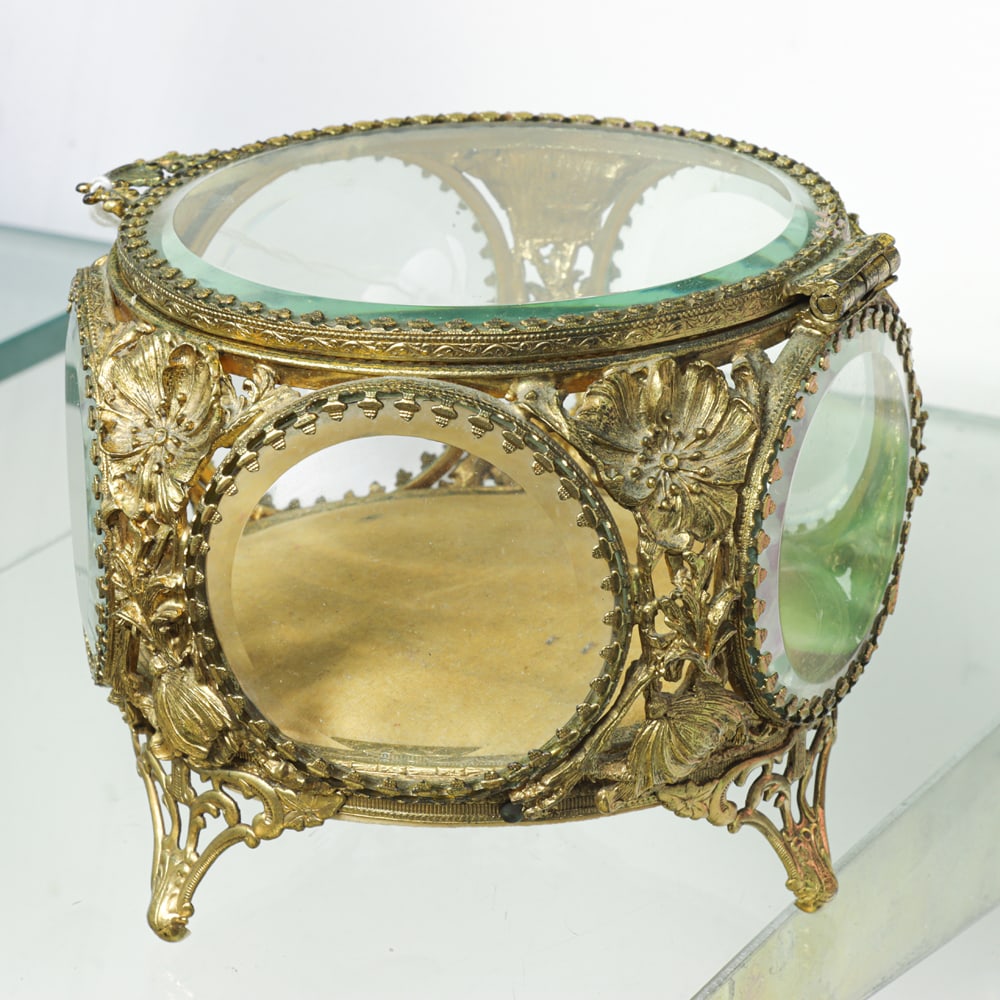 A Gilt Metal and Glass Dresser Box: A French gilt metal and glass dresser box, 4.25"h x 5"dia
