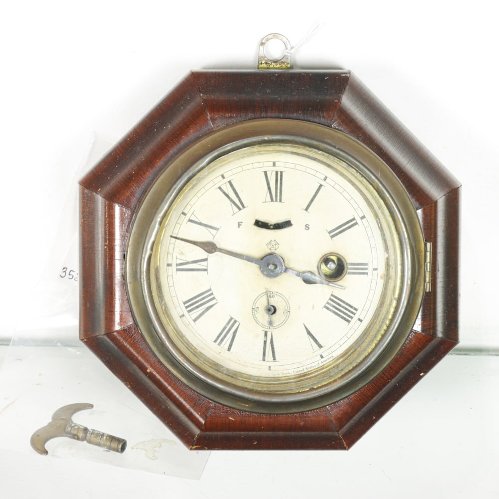 A diminutive American Ansonia clock in octagonal ogee case (1 of 1)