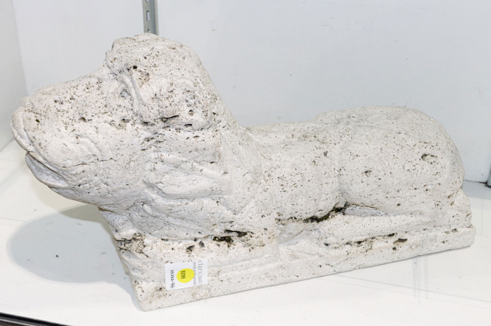 A Medieval style resting lion figure in limestone: A Medieval style resting lion figure in limestone, 10.5"h x 18"l x 5.50"d