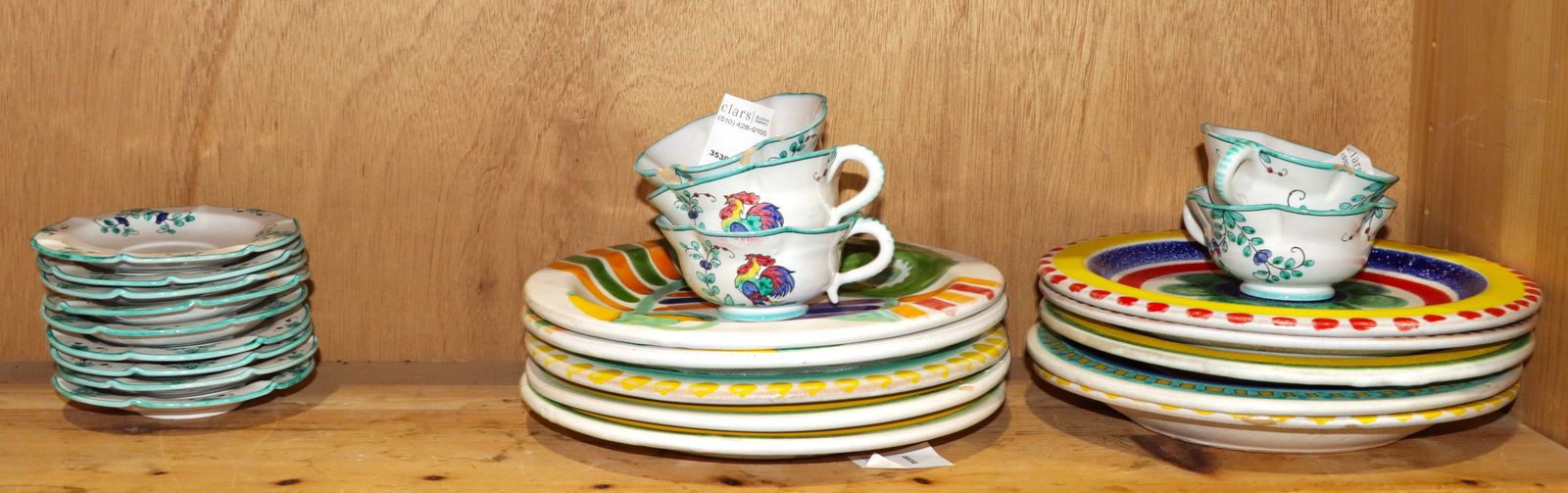 A group of Italian pottery: A group of Italian pottery, comprising (10) Desimone plates, 10.25"dia and (5) Cantagalli majolica cups and (9) saucers [24 total]