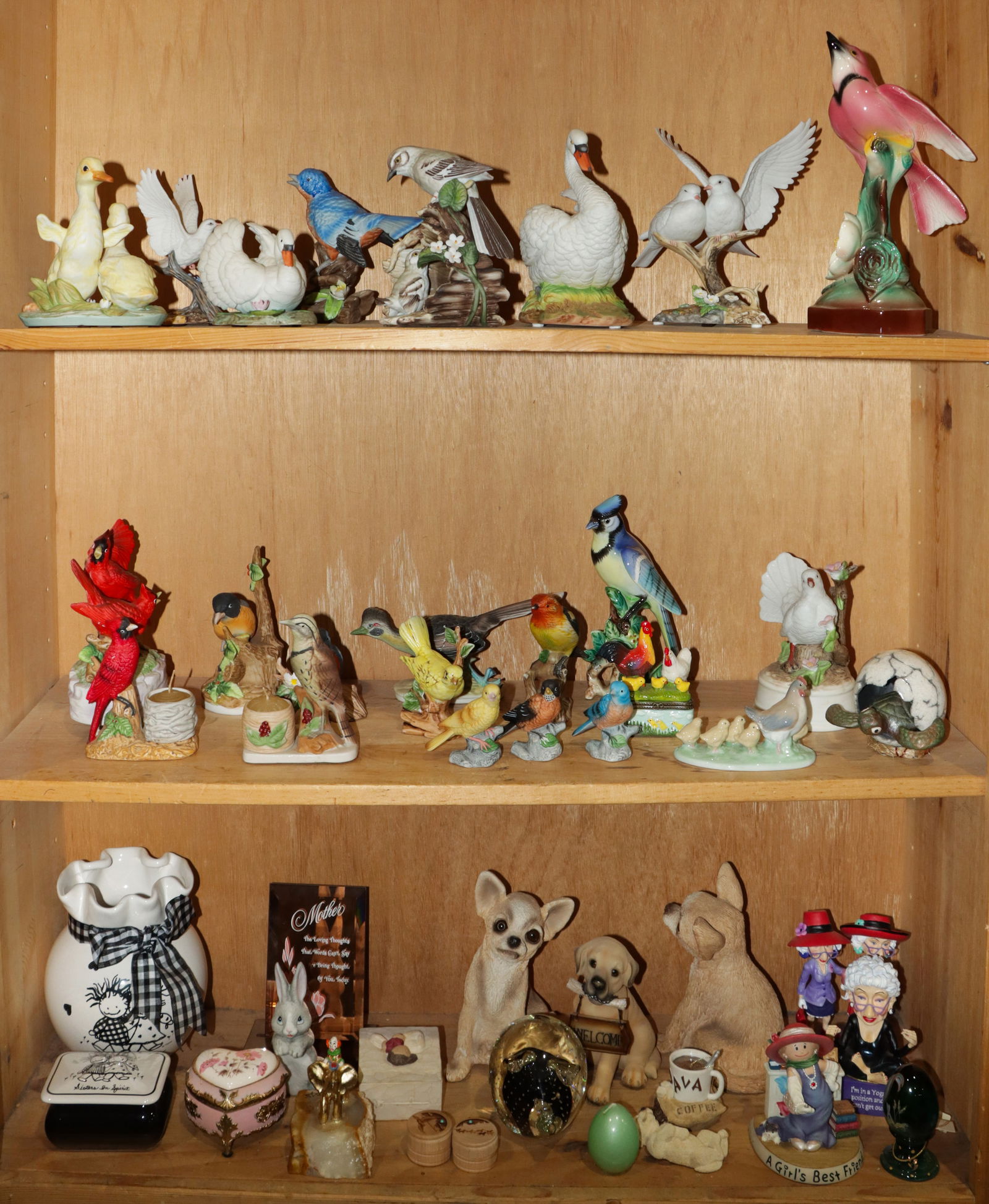 A group of bird, dog and other figures (1 of 1)